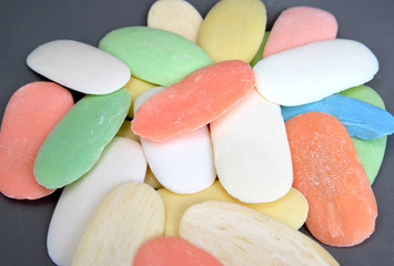 Remnants of a cake of soap of a toilet soap of different flowers