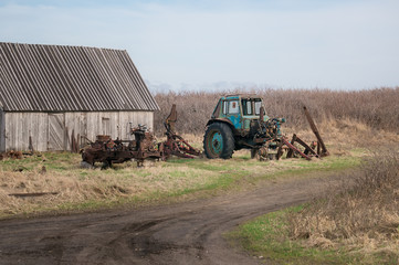 broken tractor in the countryside