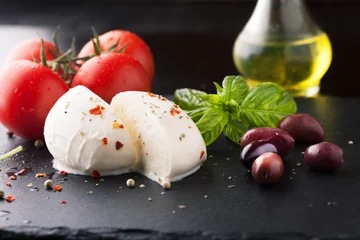 Foto op Plexiglas Caprese salad with mozzarella, fresh tomato and basil © Belokoni Dmitri