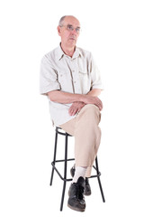 Old man sitting on a chair.