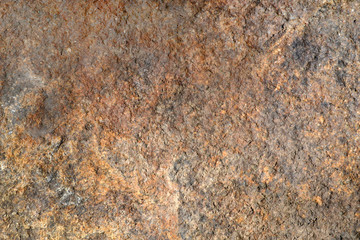 stone surface texture . Brown color closeup .