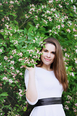 portrait of a girl near the bush