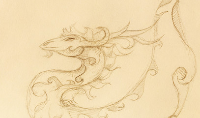 drawing of ornamental dragon on old paper background.
