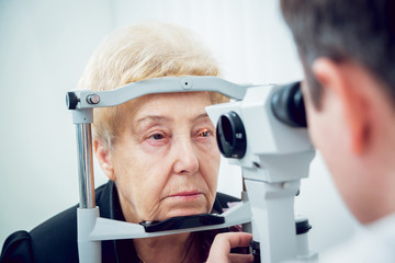 Consultation with an ophthalmologist - obrazy, fototapety, plakaty