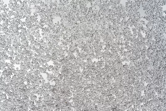 Background. The sleet on an inclined window