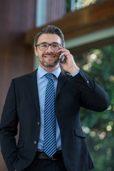 Businessman talking on mobile phone