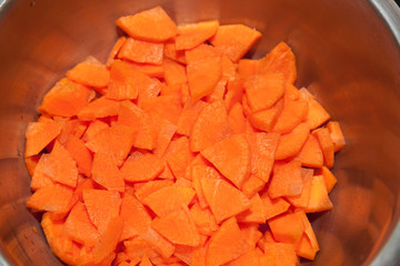 Closeup of chopped carrots in a bowl