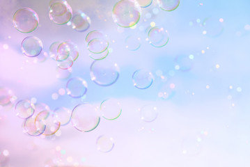 Soap bubbles floating in the air against sky
