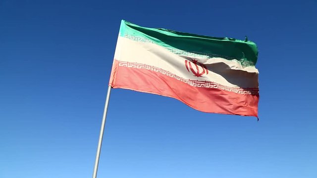 in iran iranian waving flag in the blue sky and wind
