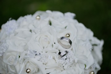 rings and wedding bouquet
