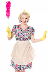 happy retro housewife, with feather duster, isolated on white