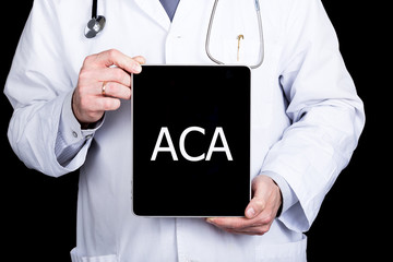 technology, internet and networking in medicine concept - Doctor holding a tablet pc with aca sign. Internet technologies in medicine