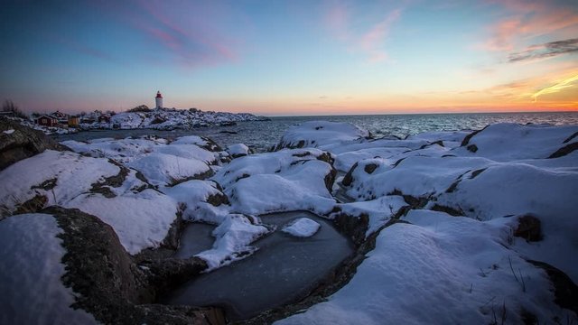 Winter in the Stockholm archipelago, Sweden. Sunset by Landsort Lighthouse, Sweden&acute;s oldest lighthouse