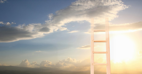 abstract image of ladder reaching into the sky