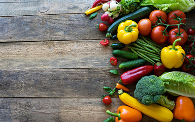 Fototapeta na wymiar image of fresh vegetables on wooden background