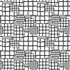 Black and white pattern of circles and squares with mosaic texture
