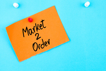 Market To Order written on orange paper note