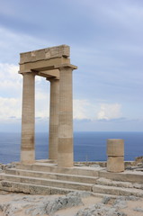 Fototapeta na wymiar Columns of the Hellenistic stoa. Acropolis of Lindos. Rhodes, Greece.