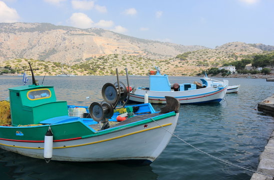 Boats in the harbor of Panormitis. Symi island, Greece. 