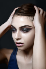 Fototapeta na wymiar Dark and dramatic makeup on model.