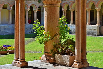 The medieval cloister of the Romanesque church of San Zeno in Verona , Italy .