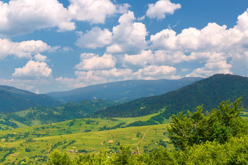 Fototapeta na wymiar Mountain valley on a background of cloudy sky
