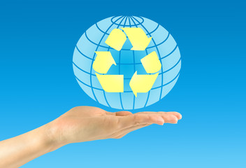 Sign of recycling in a man's hand