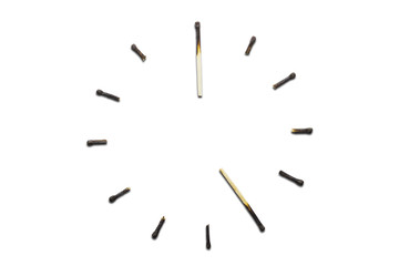 Ticking away / A photo of a clock made of matches.
