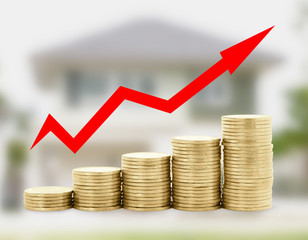 Gold coin diagram with arrow on home blur background , success f