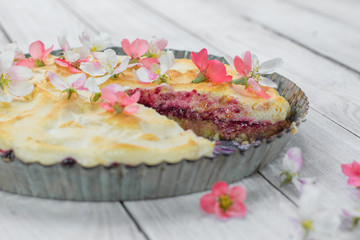 Cut Fruit Pie with Flowers and Whipped Egg Whites