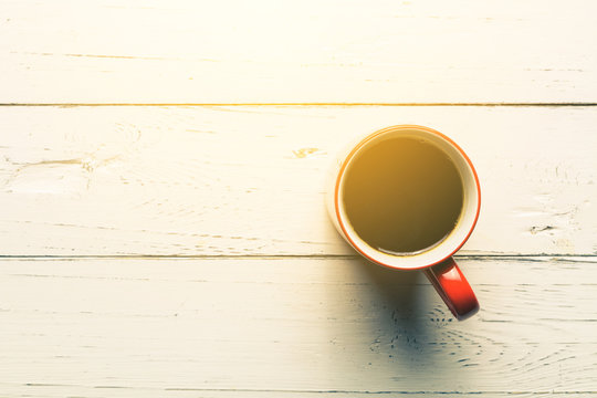 A Cup Of Black Coffee On White Wood Table, Overhead View Of A Cu