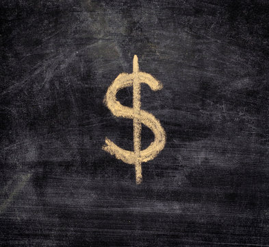 Drawn Dollar Sign On Black Chalkboard Background