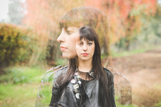 Double image of young woman outdoors