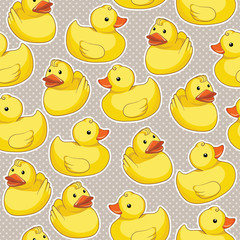 Vector seamless pattern with yellow ducks