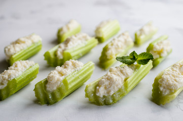 Celery with cream cheese, selective focus