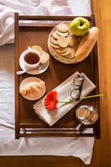 Traditional breakfast in the bed. Top view