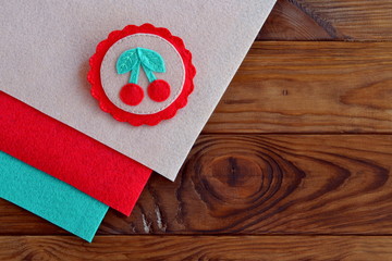 Felt brooch, hand embroidery, fabric brooch, felt art, felt jewelry. Felt kids crafts. Copy space for text