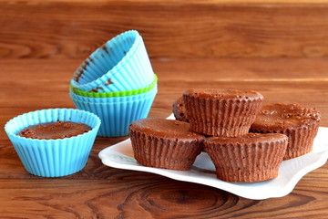 Chocolate cupcakes. Chocolate muffins. Delicious homemade cupcakes. Baking molds. Chocolate cupcake in a mold