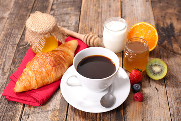 coffee cup,croissant and fruit