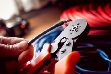 Electrical equipment. Electricity cable and crimper.