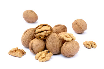 Fresh walnut with a shell isolated on white background