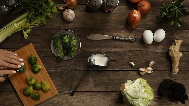 cabbage, garlic and onions on old wooden table