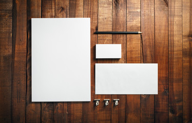 Photo of blank stationery set on wood background. Blank stationery and corporate identity template....