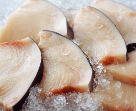 Raw sliced sword fish on crushed ice