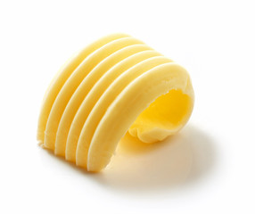 butter curl on white background