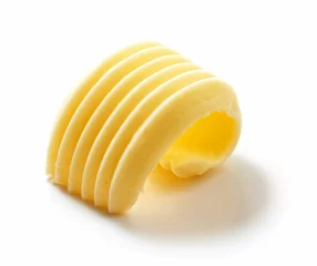 Papier Peint photo Produits laitiers butter curl on white background