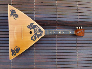russian balalaika on dark blind