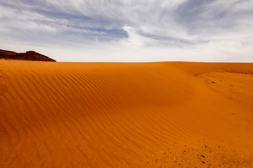 Sand dunes under dramatic  sky, Wadi Rum, Jordan. concept of global warming.