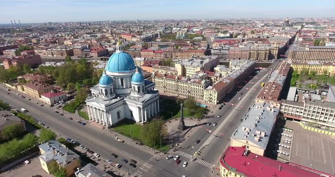 Crossing of Izmailovsky avenue and Krasnoarmeiskaya street with the Trinity Orthodox Cathedral with blue domes. Center of city, St. Petersburg, Russia
