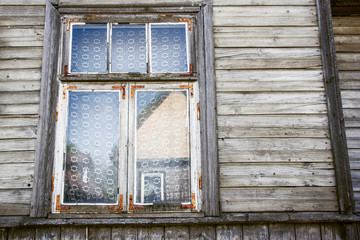 Fototapeta na wymiar Rustic cottage wooden window in the countryside.